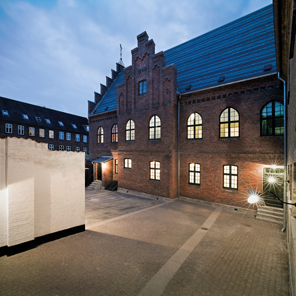 In the yard was originally laid out outdoor space for the prisoners. In the corner is the front door to the detainee's private home. / Credit: Jens Markus Lindhe